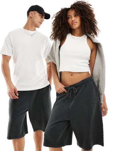 Pantaloncini unisex slavato - ASOS DESIGN - Modalova