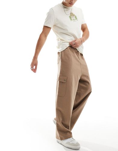 Pantaloni marroni con tasche stile cargo e gamba a palloncino - ASOS DESIGN - Modalova