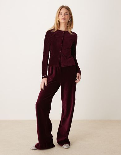 Pantaloni a fondo ampio in velluto a coste bordeaux - ASOS DESIGN - Modalova