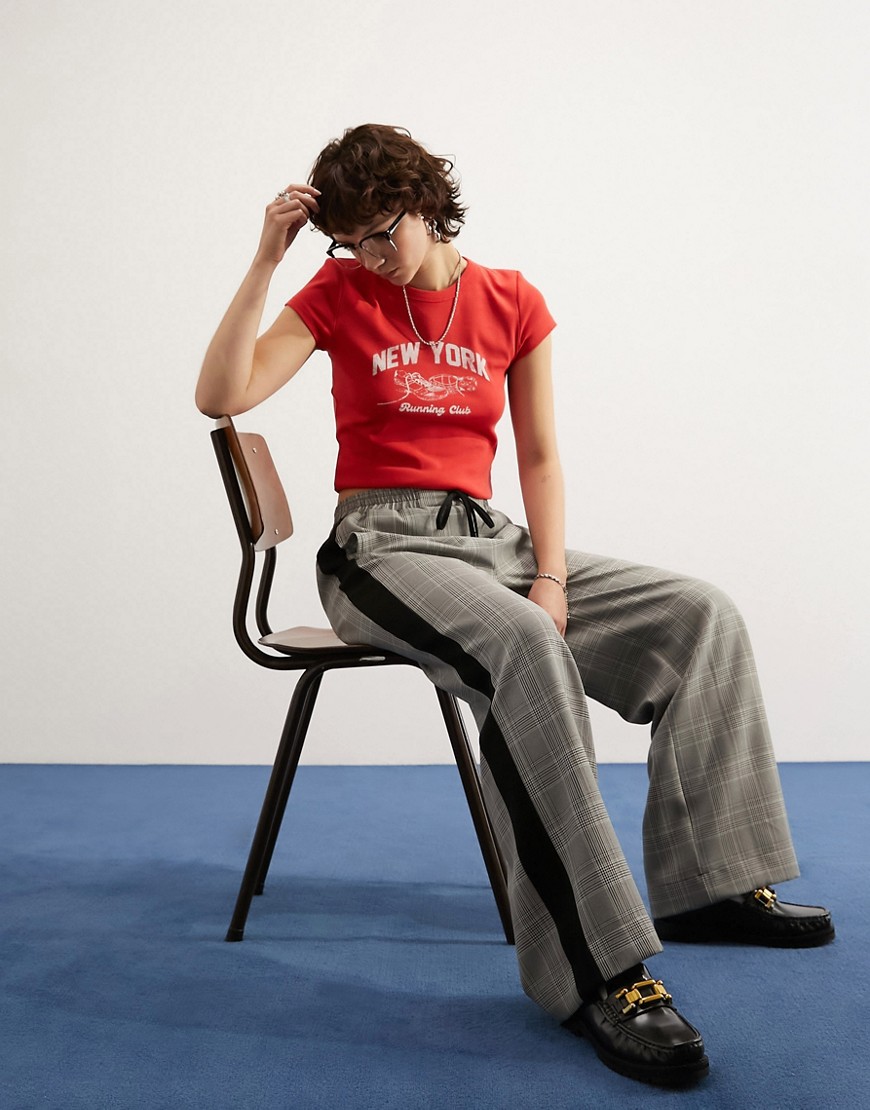 Pantaloni a quadri con righe laterali a contrasto - ASOS DESIGN - Modalova