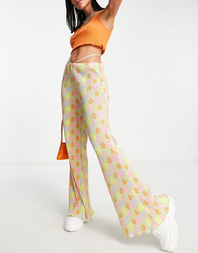 Pantaloni a zampa plissé con laccetto in vita rimovibile in poliestere a fiori - MULTI - ASOS DESIGN - Modalova