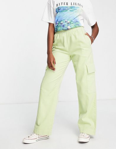 Pantaloni ampi color lime in velluto a coste con tasche applicate - ASOS DESIGN - Modalova