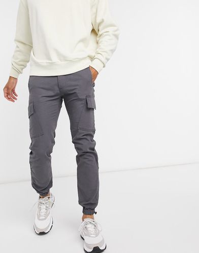 Pantaloni cargo slim con fermacorda sul fondo ripstop neri - ASOS DESIGN - Modalova