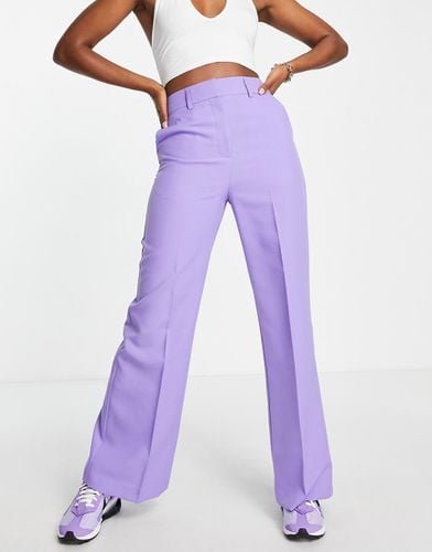 Pantaloni comodi a fondo ampio a zampa lilla - ASOS DESIGN - Modalova