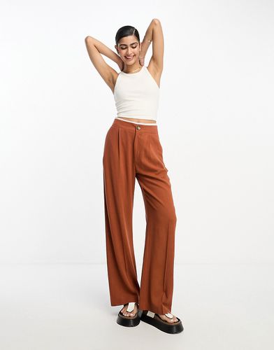 Pantaloni comodi color ruggine in misto lino - ASOS DESIGN - Modalova