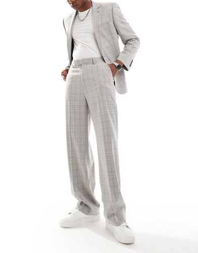 Pantaloni da abito a fondo ampio a quadri tono su tono grigi - ASOS DESIGN - Modalova