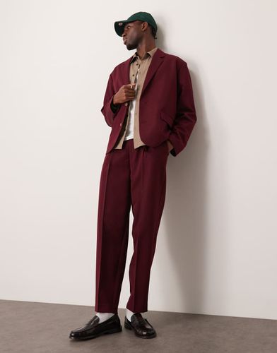 Pantaloni da abito affusolati oversize bordeaux in twill - ASOS DESIGN - Modalova