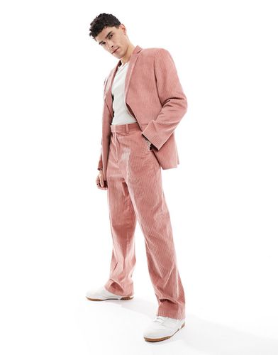 Pantaloni da abito ampi in velluto a coste rosa corallo - ASOS DESIGN - Modalova