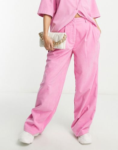 Pantaloni drappeggiati a fondo ampio rosa a costine in coordinato - ASOS DESIGN - Modalova