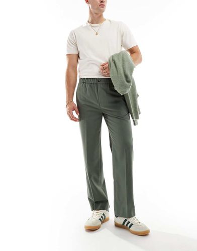 Pantaloni dritti eleganti verdi oliva elasticizzati in vita - ASOS DESIGN - Modalova