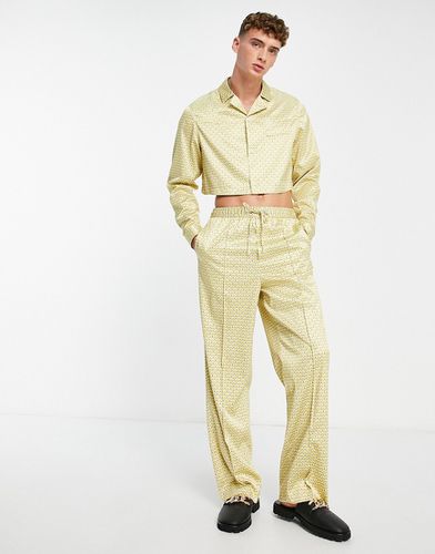 Pantaloni eleganti a fondo ampio con stampa geometrica in coordinato - ASOS DESIGN - Modalova