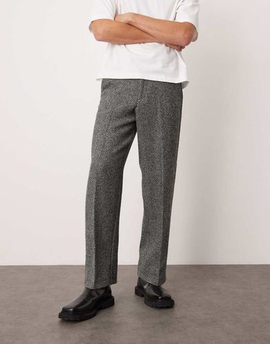 Pantaloni eleganti a fondo ampio in misto lana neri con motivo a spina di pesce - ASOS DESIGN - Modalova