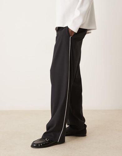 Pantaloni larghi eleganti neri con profili a contrasto - ASOS DESIGN - Modalova