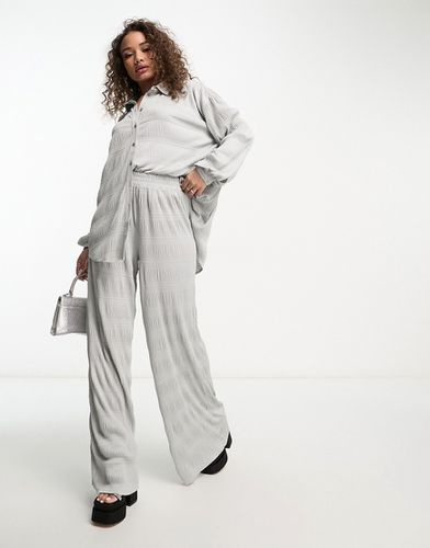 Pantaloni plissé a fondo ampio color in coordinato - ASOS DESIGN - Modalova