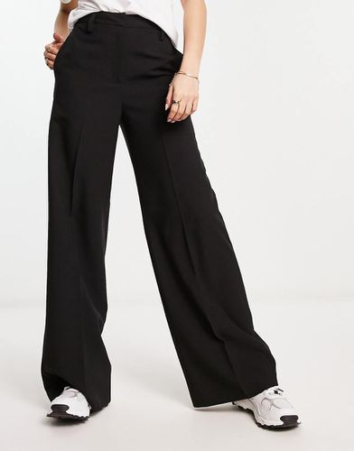 Pantaloni sartoriali neri a fondo ampio - ASOS DESIGN - Modalova