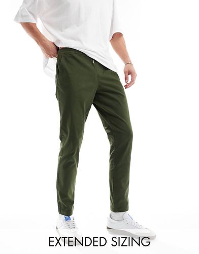 Pantaloni slim kaki - ASOS DESIGN - Modalova