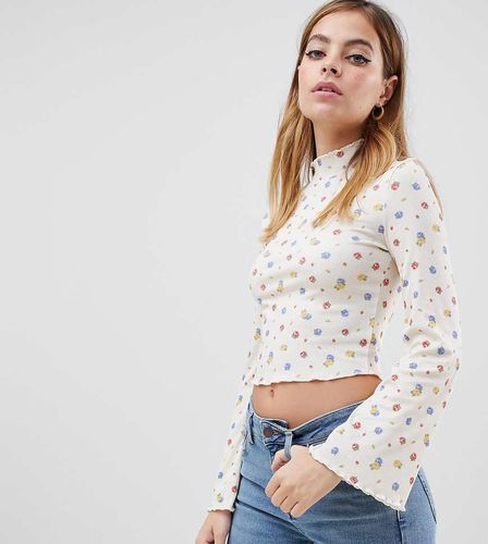 ASOS DESIGN Petite - Top a coste a fiorellini con maniche ampie - ASOS Petite - Modalova