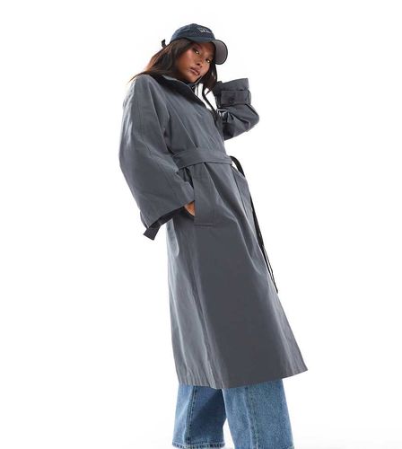 ASOS DESIGN Petite - Trench taglio lungo oversize blu navy con scollo a imbuto - ASOS Petite - Modalova