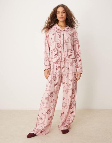 Pigiama con stampa stile rodeo in modal composto da pantaloni a fondo ampio e camicia - ASOS DESIGN - Modalova