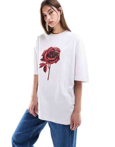 T-shirt bianca con rosa rossa - ASOS DESIGN - Modalova