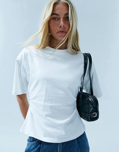 T-shirt bianca con vita a corsetto - ASOS DESIGN - Modalova