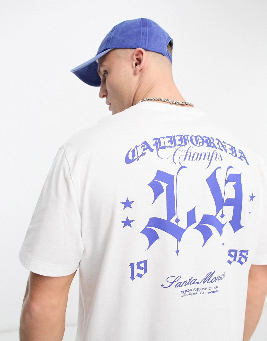 T-shirt comoda bianca con scritta "California" sul retro - ASOS DESIGN - Modalova