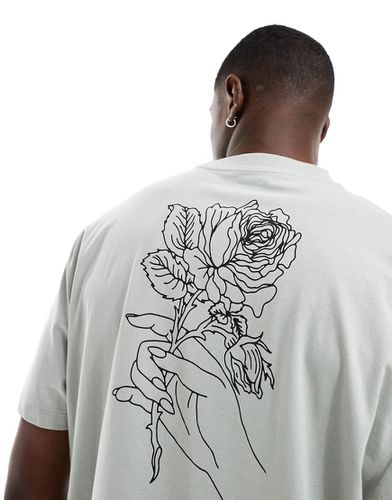 T-shirt comoda grigia con stampa di fiore sulla schiena - ASOS DESIGN - Modalova
