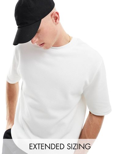 T-shirt girocollo comoda sporco testurizzata - ASOS DESIGN - Modalova