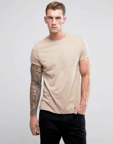 T-shirt girocollo con maniche con risvolto - ASOS DESIGN - Modalova