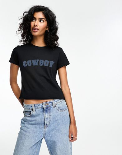 T-shirt mini nera con stampa "Cowboy" in denim - ASOS DESIGN - Modalova