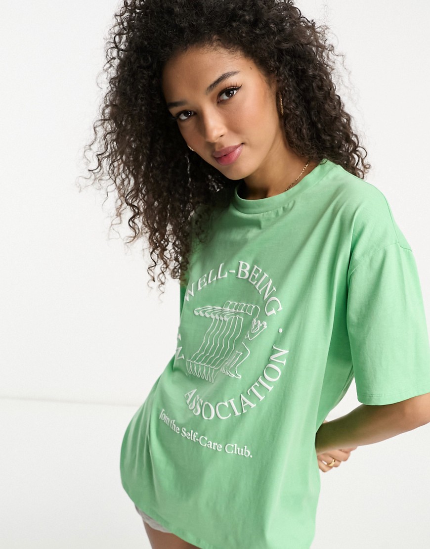 T-shirt oversize con stampa "Wellbeing" in rilievo - ASOS DESIGN - Modalova