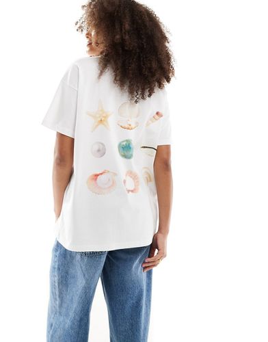 T-shirt oversize avorio con grafica di conchiglia - ASOS DESIGN - Modalova