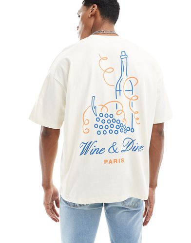 T-shirt oversize bianco sporco con stampa "Paris" e vino sul retro - ASOS DESIGN - Modalova