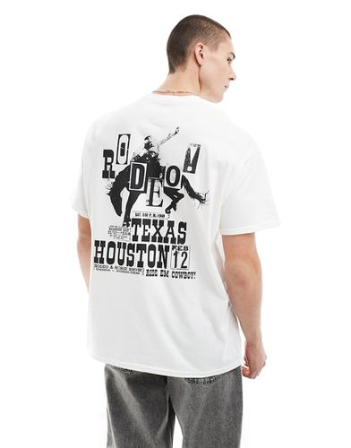 T-shirt oversize bianca con stampa di cowboy sul retro - ASOS DESIGN - Modalova