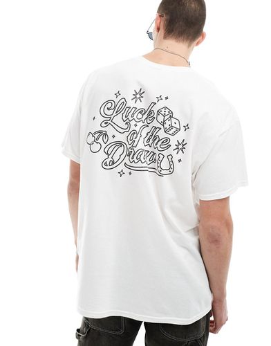 T-shirt oversize con stampa "Luck of the draw" sul retro - ASOS DESIGN - Modalova