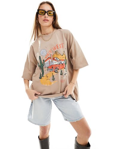 T-shirt oversize color cammello con stampa grafica "Out West" - ASOS DESIGN - Modalova