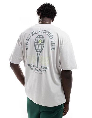 T-shirt oversize grigia con stampa tennis sulla schiena - ASOS DESIGN - Modalova
