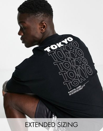 T-shirt oversize nera con scritta "Tokyo" sul retro - ASOS DESIGN - Modalova