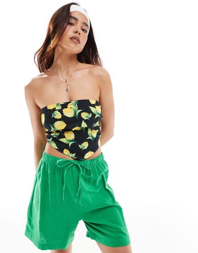 Top a fascia con dettaglio a V e stampa di frutta - ASOS DESIGN - Modalova