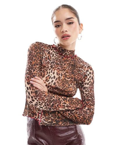 Top dolcevita leopardato con bordi a contrasto - ASOS DESIGN - Modalova