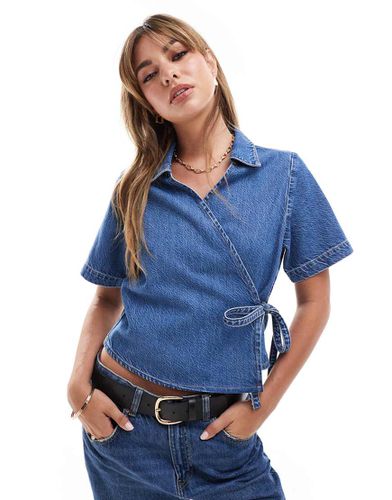 Top in denim indaco a maniche corte - ASOS DESIGN - Modalova