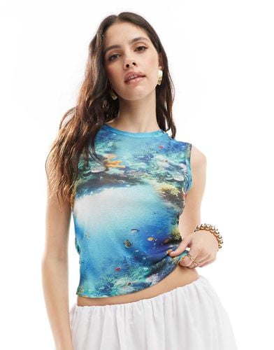 Top senza maniche in rete con grafica oceano - ASOS DESIGN - Modalova