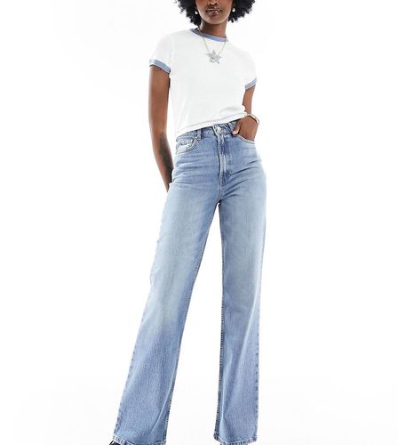 Tall - Jeans comfort stretch dritti lavaggio medio - ASOS DESIGN - Modalova