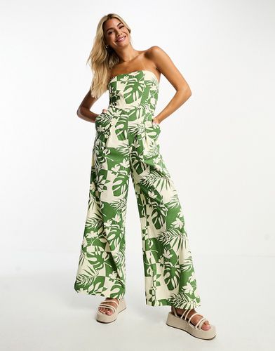 Tuta jumpsuit a fascia effetto lino verde a fiori con spallina rimovibile - ASOS DESIGN - Modalova