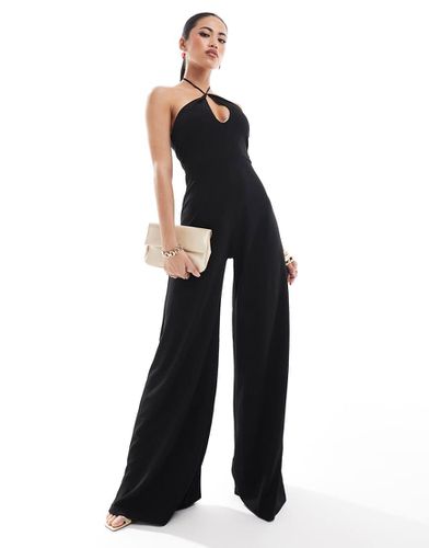 Tuta jumpsuit a fondo ampio nera allacciata al collo con cut-out - ASOS DESIGN - Modalova