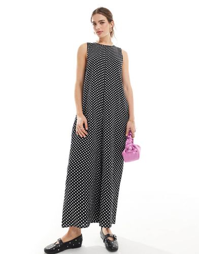 Tuta jumpsuit girocollo con pantaloni culotte nera e bianca a pois - ASOS DESIGN - Modalova