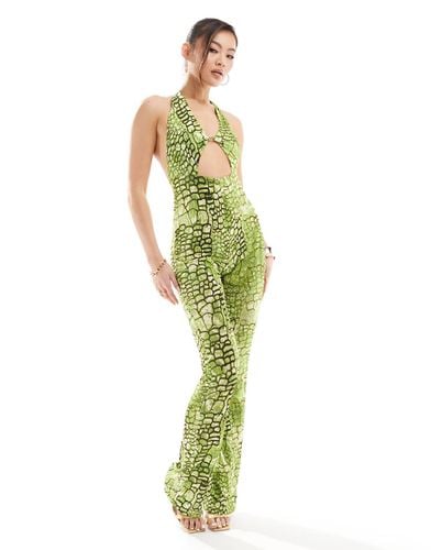 Tuta jumpsuit slim verde fluo con stampa pitonata e cut-out - ASOS DESIGN - Modalova