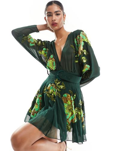 Vestito corto con gonna morbida a godet, cintura in vita e decorazioni floreali verde - ASOS DESIGN - Modalova
