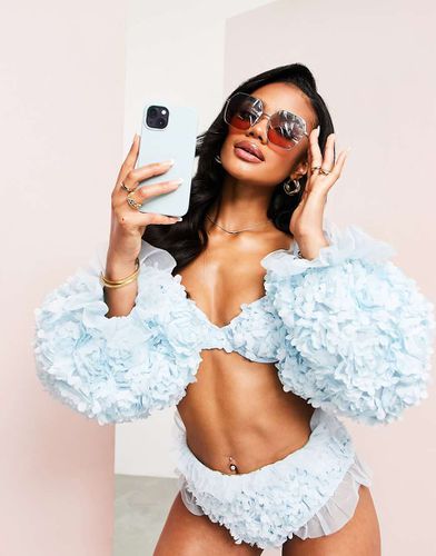 Top bikini con maniche a sbuffo e scollo Bardot a fiori 3D - ASOS LUXE - Modalova