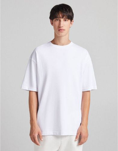 T-shirt oversize bianca - Bershka - Modalova